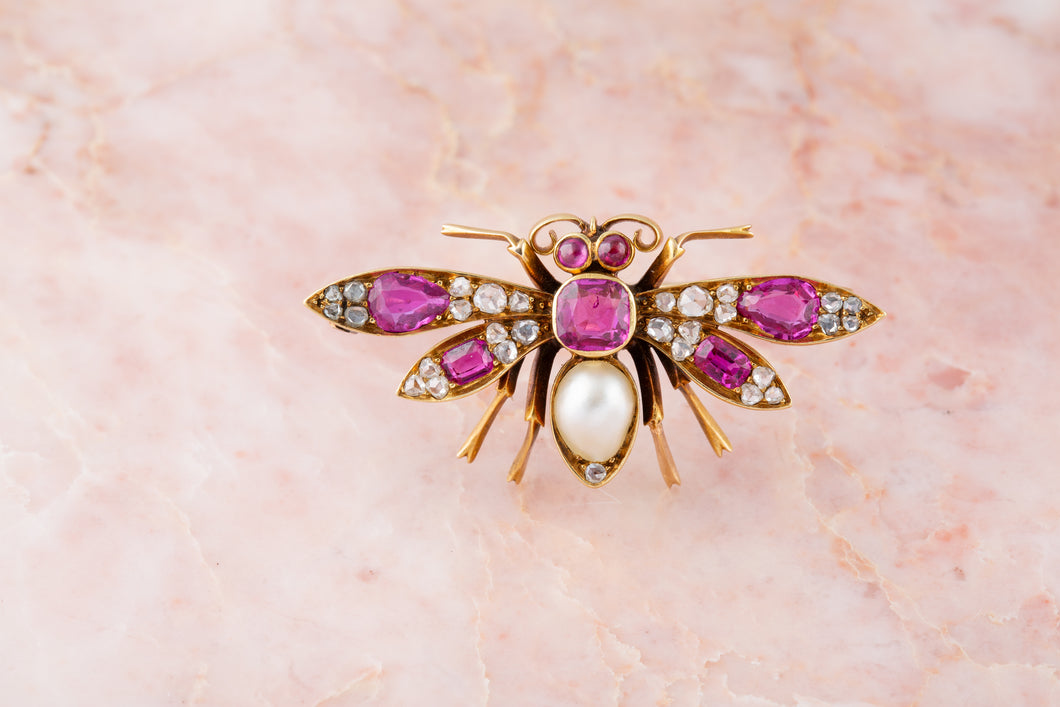 An 19th century Burmese ruby, natural pearl and diamond butterfly brooch