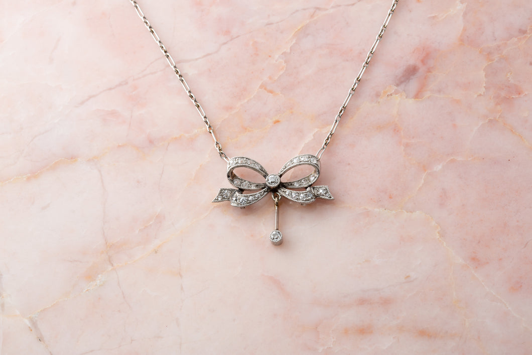 An early 20th century bow diamond necklace