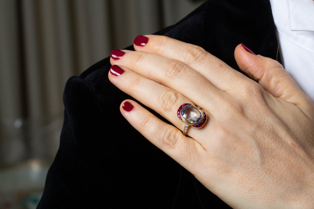 An early 20th century diamond ruby sapphire ring